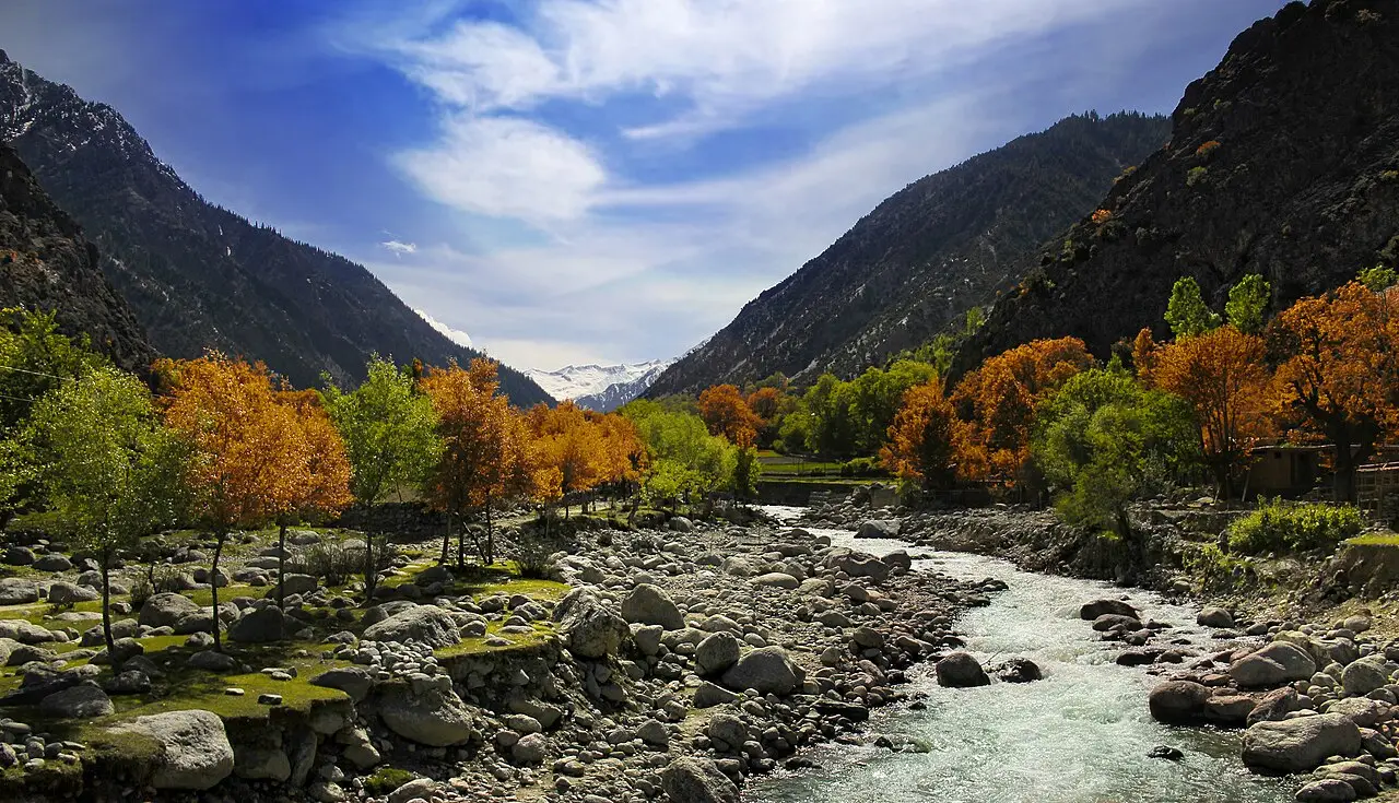 Autumn trees along the Bumburet river in the Kalash valleys